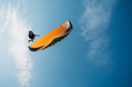 Parachutist flying in blue clear sky, Crimea, Ukraine, May 2013の写真素材