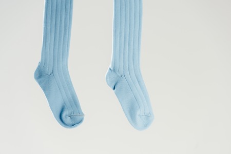 Pair of blue cotton socks isolated on greyの写真素材