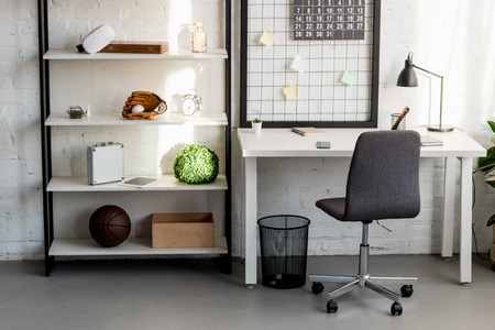 Interior of cozy workplace at home officeの写真素材