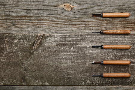 Top view of five carpentry files tools on wooden backgroundの写真素材