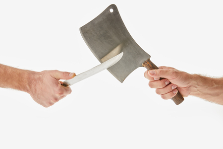 Partial view of men holding and sharpening knifes isolated on whiteの写真素材