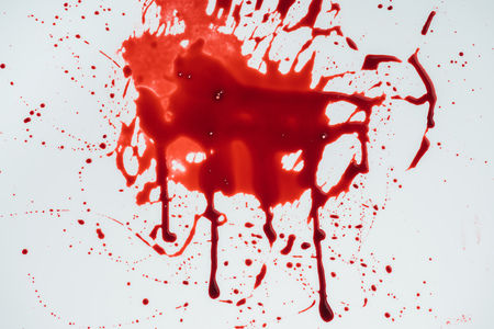 top view of blood blot on white surface