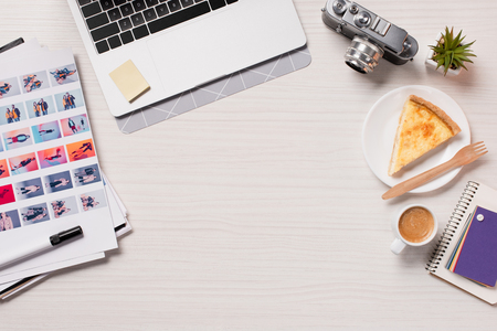 office desk with laptop, designer supplies and copy space, flat layの写真素材