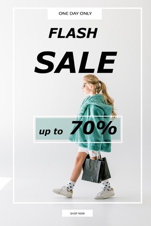 blonde female child in turquoise fur coat posing with black shopping bags on white, sale banner...