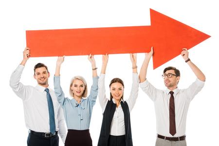 young successful business team holding big red arrow isolated on whiteの写真素材