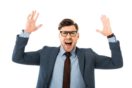 emotional businessman in suit rejoicing and gesturing isolated on whiteの写真素材
