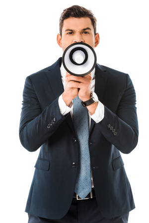 aggressive businessman shouting at megaphone isolated on whiteの写真素材