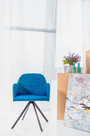 Blue modern chair in stylish roomの写真素材