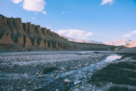 beautiful natural formations and rocky mountain river in Indian Himalayas, Ladakh regionの写真素材