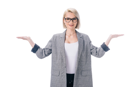 attractive elegant businesswoman with shrug gesture, isolated on whiteの写真素材