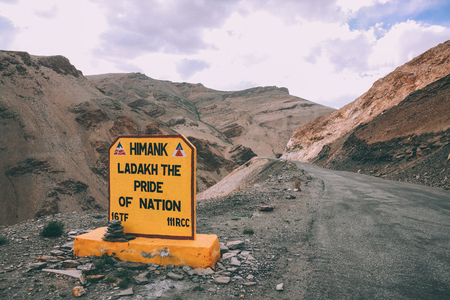 close-up view of sign on mountain road in Indian Himalayas, Ladakh regionの写真素材