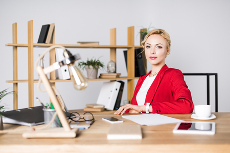 portrait of beautiful businesswoman at workplace in officeの写真素材