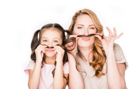 portrait of family having fun together isolated on whiteの写真素材