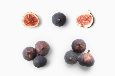 ripe fresh figs isolated on whiteの写真素材