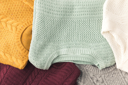 top view of warm knitted sweaters