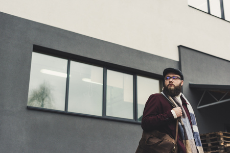 handsome bearded man in stylish autumn clothingの写真素材