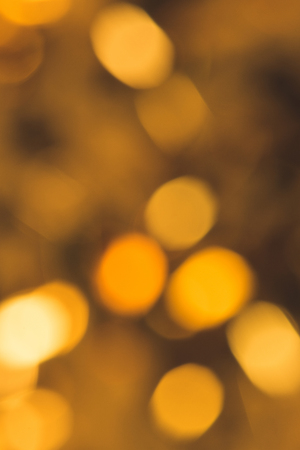 full frame of defocused bright christmas festive lightsの写真素材