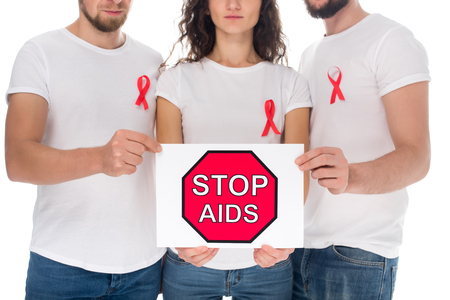 cropped shot of group of people with stop aids banner isolated on white