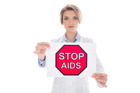 female doctor with stop aids placard isolated on white