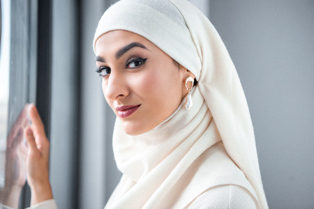 portrait of beautiful young muslim woman smiling at cameraの写真素材