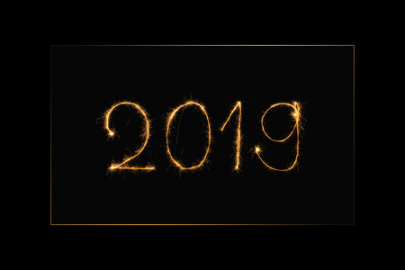 close up view of 2019 year light sign on black backgroundの写真素材