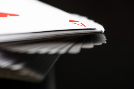selective focus of playing cards in deck on black backgroundの写真素材