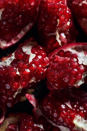 Close up shot of ripe cut pomegranates