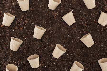 top view of used paper cups on ground,  protecting nature conceptの写真素材