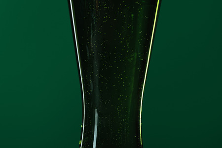 close up of beer glass isolated on green, st patrick day conceptの写真素材