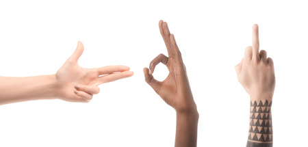 Collage of multiethnic men showing hand gestures isolated on whiteの写真素材