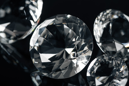 collection of clear diamonds isolated on black