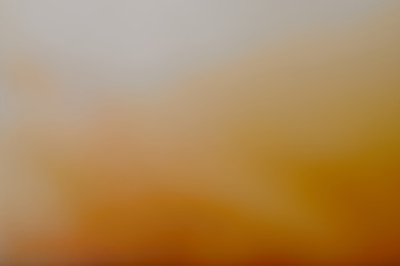 abstract orange watercolor paint backgroundの写真素材