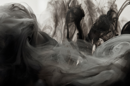 abstract background with black mixing paintの写真素材