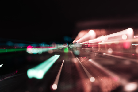 long exposure of bright colorful illumination at nightの写真素材