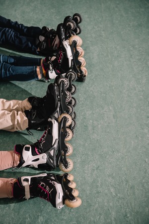 Partial view of kids in roller skates having fun togetherの写真素材