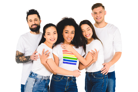 multiethnic group of young people smiling and hugging with african american woman with lgbt sign on t-shirt isolated on whiteの写真素材