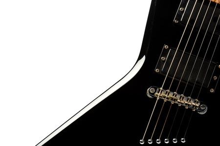close up view of black electric guitar isolated on whiteの写真素材