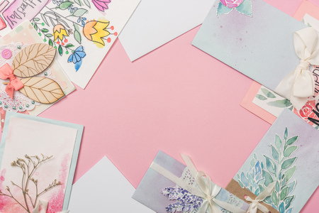 different mothers day greeting cards on pink background with copy spaceの写真素材