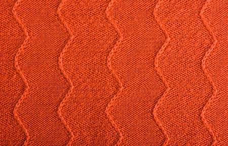 coral knitted fabric with pattern, color of 2019 concept