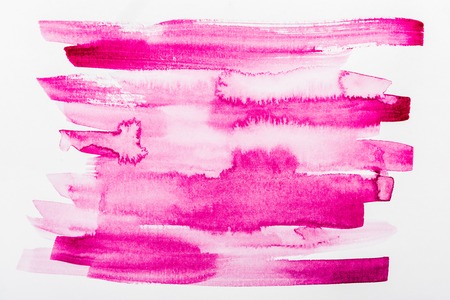 top view of pink brushstrokes on white paperの写真素材