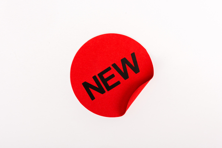 top view of icon with word 'new' isolated on whiteの写真素材