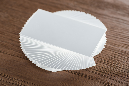 top view of empty card on wooden table with copy space