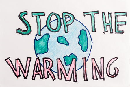 globe sign and handwritten lettering "stop the warming" on white backgroundの写真素材