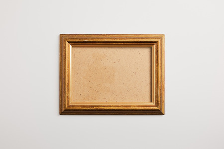 wooden blank square frame on white backgroundの写真素材