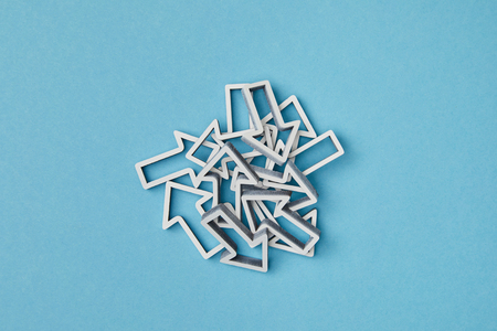 top view of mixed white arrows on blue backgroundの写真素材