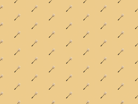 scattered flour in spoons on yellow background, seamless patternの写真素材