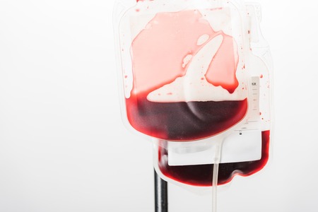 Drips with blood isolated on grey, blood donation conceptの写真素材