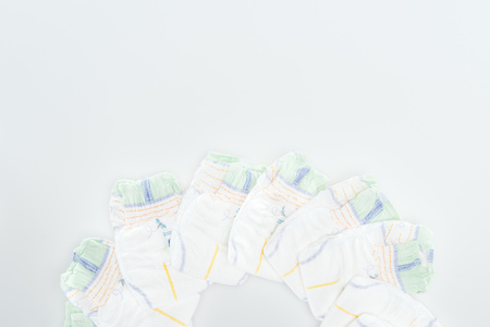top view of soft and dry diapers isolated on white with copy spaceの写真素材
