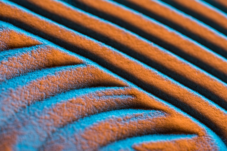 close up view of textured sand background with lines and color filterの写真素材
