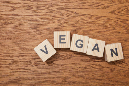 Top view of wooden blocks with letters on wooden surfaceの写真素材
